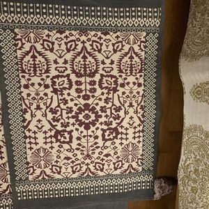 2 rugs 2’ by 3’